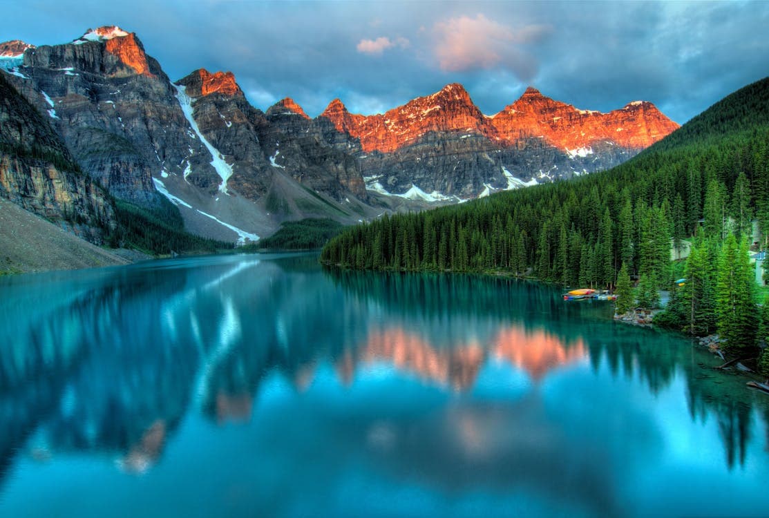Mountain lake reflecting golden hour light
